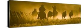 Silhouette of Wranglers Rounding Up Horses, Ponderosa Ranch, Seneca, Oregon, USA-Wendy Kaveney-Stretched Canvas