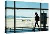 Silhouette of Young Woman Walking at Airport-Nomad Soul-Stretched Canvas