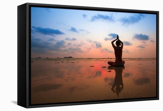 Silhouette Young Woman Practicing Yoga On The Beach At Sunset-De Visu-Framed Stretched Canvas