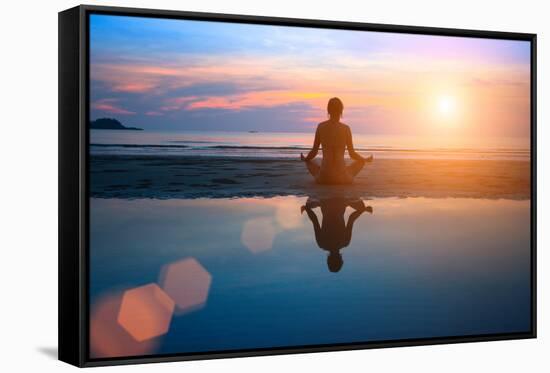 Silhouette Young Woman Practicing Yoga on the Beach at Sunset-De Visu-Framed Stretched Canvas