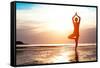 Silhouette Young Woman Practicing Yoga on the Beach at Sunset-De Visu-Framed Stretched Canvas