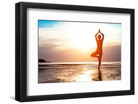 Silhouette Young Woman Practicing Yoga on the Beach at Sunset-De Visu-Framed Photographic Print