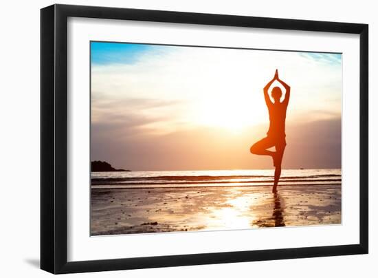 Silhouette Young Woman Practicing Yoga on the Beach at Sunset-De Visu-Framed Photographic Print