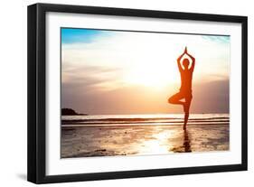 Silhouette Young Woman Practicing Yoga on the Beach at Sunset-De Visu-Framed Photographic Print