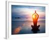 Silhouette Young Woman Practicing Yoga on the Beach at Sunset.-De Visu-Framed Photographic Print