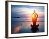 Silhouette Young Woman Practicing Yoga on the Beach at Sunset.-De Visu-Framed Photographic Print