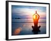 Silhouette Young Woman Practicing Yoga on the Beach at Sunset.-De Visu-Framed Photographic Print