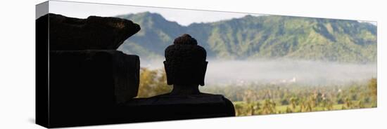 Silhouetted Buddha at Borobudur Temple at Sunrise, UNESCO World Heritage Site, Java, Indonesia-Matthew Williams-Ellis-Stretched Canvas