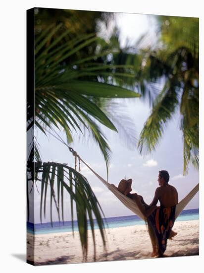 Silhouetted Couple, Felidu Atoll, Maldives-Stuart Westmorland-Stretched Canvas