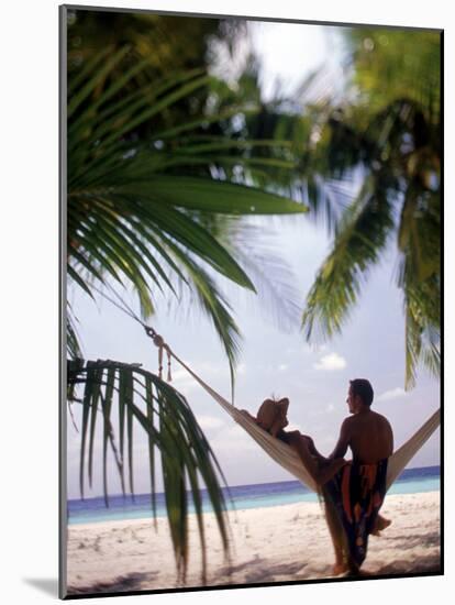 Silhouetted Couple, Felidu Atoll, Maldives-Stuart Westmorland-Mounted Photographic Print
