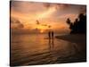Silhouetted Couple, Felidu Atoll, Maldives-Stuart Westmorland-Stretched Canvas