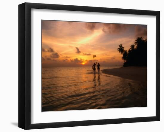 Silhouetted Couple, Felidu Atoll, Maldives-Stuart Westmorland-Framed Premium Photographic Print