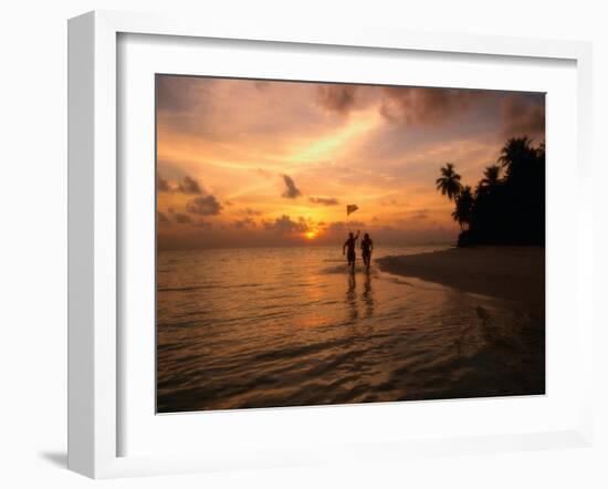 Silhouetted Couple, Felidu Atoll, Maldives-Stuart Westmorland-Framed Premium Photographic Print