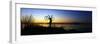 Silhouetted Cyclist Holding Bicycle over Head, River's Edge, Sunset, Alaska-null-Framed Photographic Print
