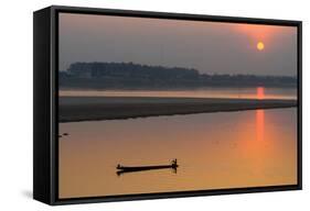 Silhouetted Man in Longtail Boat Along the Mekong River-null-Framed Stretched Canvas