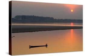 Silhouetted Man in Longtail Boat Along the Mekong River-null-Stretched Canvas