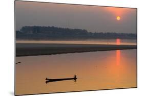 Silhouetted Man in Longtail Boat Along the Mekong River-null-Mounted Photographic Print