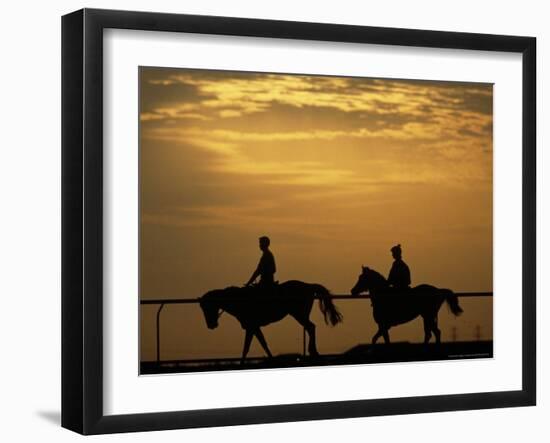 Silhouetted Men Riding on Horses, Dubai, UAE-Henry Horenstein-Framed Photographic Print