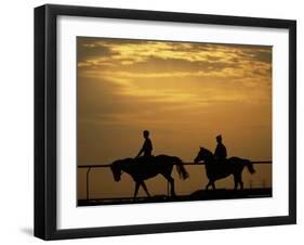 Silhouetted Men Riding on Horses, Dubai, UAE-Henry Horenstein-Framed Photographic Print