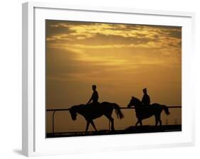 Silhouetted Men Riding on Horses, Dubai, UAE-Henry Horenstein-Framed Photographic Print