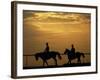 Silhouetted Men Riding on Horses, Dubai, UAE-Henry Horenstein-Framed Photographic Print