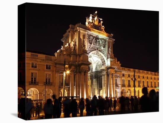 Silhouetted People on Praca Do Comercio under the Illuminated Rua Augusta Arch at Night in Central -Stuart Forster-Stretched Canvas