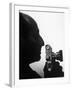 Silhouetted Profile of Photographer Alfred Eisenstaedt with a Camera-Alfred Eisenstaedt-Framed Premium Photographic Print