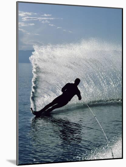 Silhouetted Water Skier-null-Mounted Photographic Print