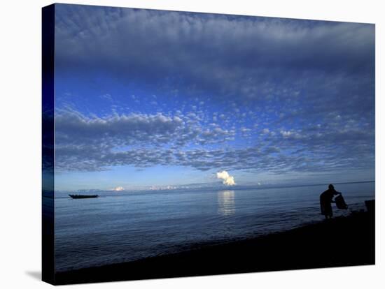 Silhouetted Woman on Lake Tanganyika, Tanzania-Kristin Mosher-Stretched Canvas