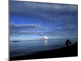 Silhouetted Woman on Lake Tanganyika, Tanzania-Kristin Mosher-Mounted Photographic Print