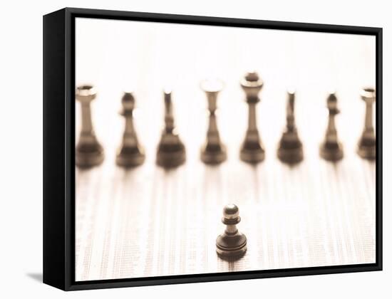 Silver Pawn on Newspaper Stock Market Report with Line of Chess Pieces-null-Framed Stretched Canvas