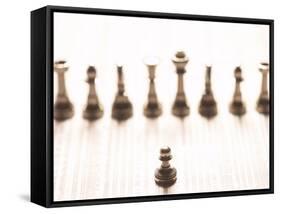 Silver Pawn on Newspaper Stock Market Report with Line of Chess Pieces-null-Framed Stretched Canvas