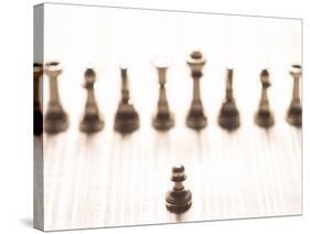 Silver Pawn on Newspaper Stock Market Report with Line of Chess Pieces-null-Stretched Canvas