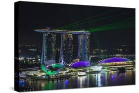 Singapore, Elevated View of the City with Evening Laser Show-Walter Bibikow-Stretched Canvas