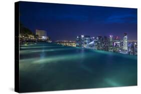 Singapore, Rooftop Swimming Pool at Dusk Overlooks the City-Walter Bibikow-Stretched Canvas