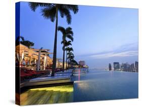 Singapore, Swimmingpool and Singapore Skyline on the 57th Floor of Marina Bay Sands Resort-Michele Falzone-Stretched Canvas