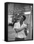 Singer and Actor Dean Martin holding a pitching club on Movie Set for MGM's "Some Came Running"-Allan Grant-Framed Stretched Canvas