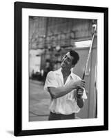 Singer and Actor Dean Martin holding a pitching club on Movie Set for MGM's "Some Came Running"-Allan Grant-Framed Premium Photographic Print