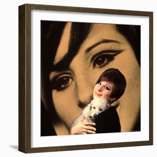 Singer and Actress Barbra Streisand Holding Small Dog in Her Arms-Bill Eppridge-Framed Premium Photographic Print