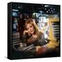 Singer Dalida in a Bookshop, C. 1968-null-Framed Stretched Canvas