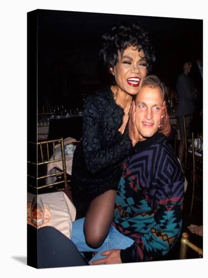 Singer Eartha Kitt and Actor Woody Harrelson-null-Stretched Canvas