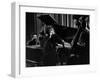 Singer Edith Piaf Holding Her Hands to Her Head While Performing with Pianist and Bass Player-Gjon Mili-Framed Premium Photographic Print