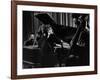 Singer Edith Piaf Holding Her Hands to Her Head While Performing with Pianist and Bass Player-Gjon Mili-Framed Premium Photographic Print