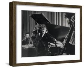 Singer Edith Piaf Holding Her Hands to Her Head While Performing with Pianist and Bass Player-Gjon Mili-Framed Premium Photographic Print