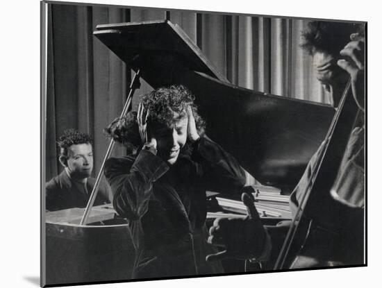 Singer Edith Piaf Holding Her Hands to Her Head While Performing with Pianist and Bass Player-Gjon Mili-Mounted Premium Photographic Print