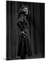 Singer Edith Piaf with Hands on Hips, Standing on Stage-Gjon Mili-Mounted Premium Photographic Print