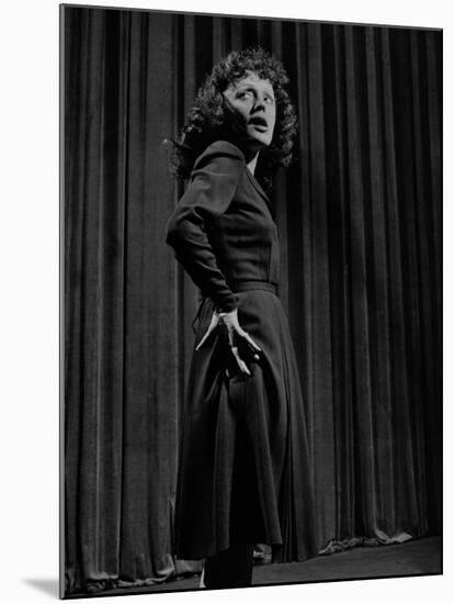 Singer Edith Piaf with Hands on Hips, Standing on Stage-Gjon Mili-Mounted Premium Photographic Print