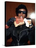 Singer Grace Jones Putting Raw Steak to Mouth-Marion Curtis-Stretched Canvas