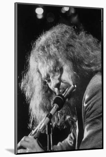 Singer Ian Anderson Playing the Flute During a Rehearsal for a TV Special-Ralph Crane-Mounted Photographic Print