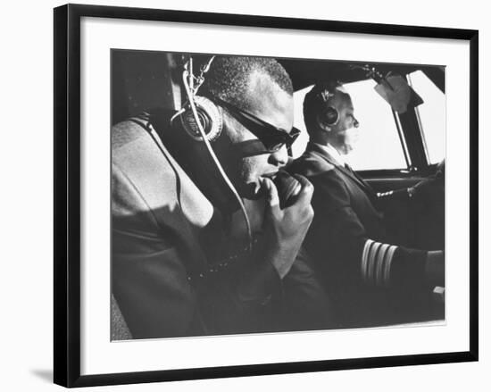 Singer Ray Charles Wearing Earphones While in His Private Plane-null-Framed Premium Photographic Print